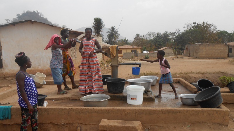 Ghanaians fetching water at the waterpump