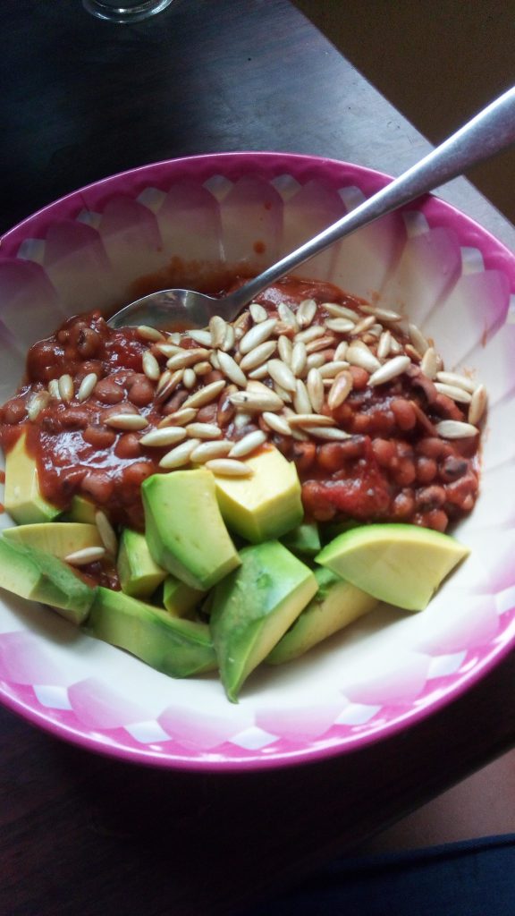 Ghanaian vegan food, beans, stew, avocado and seeds