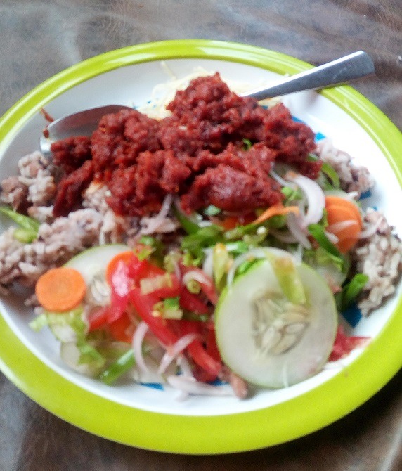 beanrice(waakye) with Ghanaian tomatostew